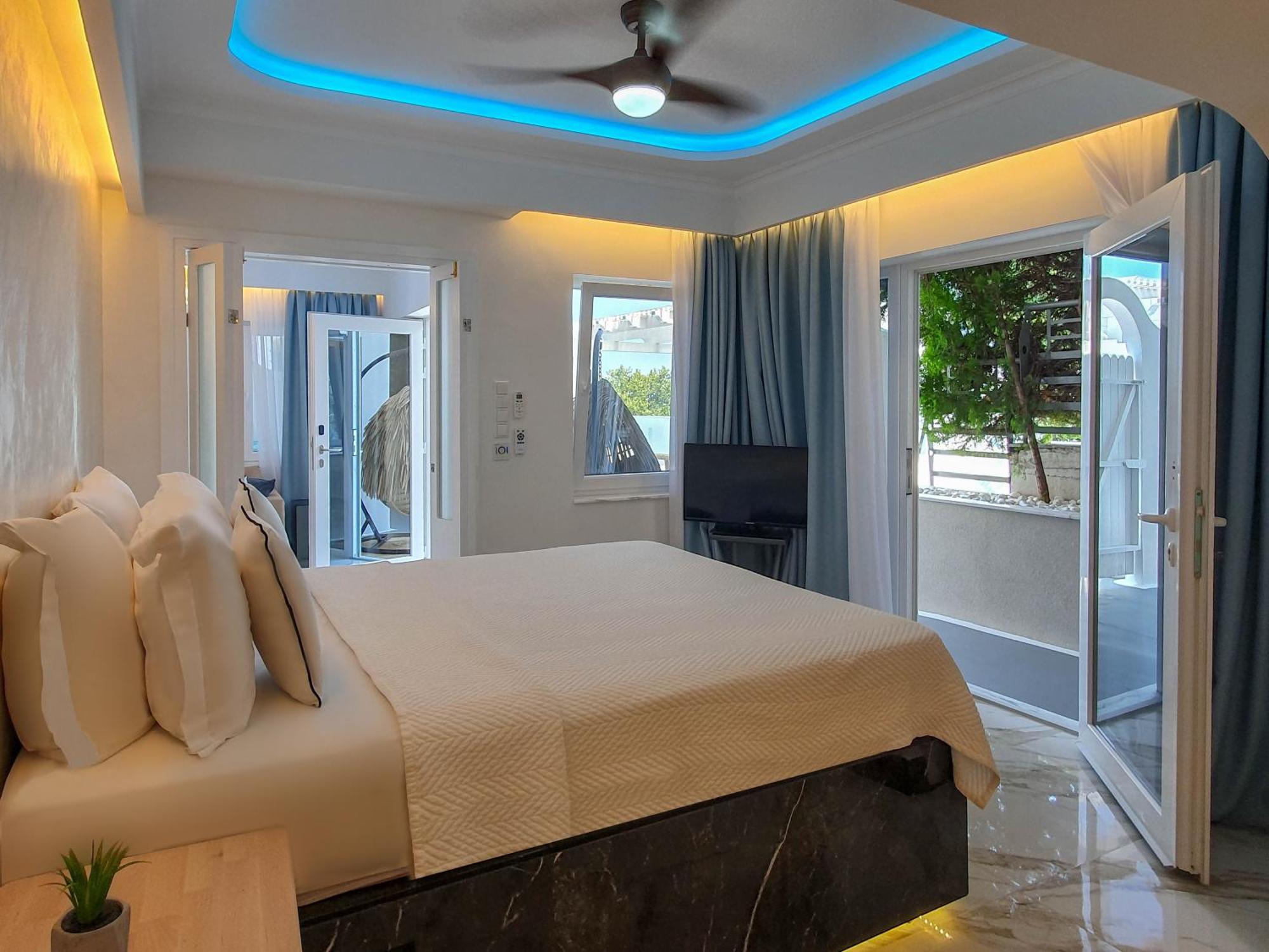 Panorama Suites & Spa - Adults Only Stomio Room photo